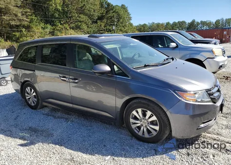 2014 Honda Odyssey Exl z USA, uszkodzony, nr VIN 5FNRL5H69EB102832